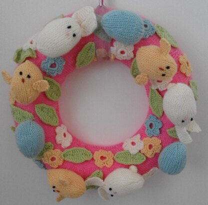 Knitted Easter wreath with chicks and bunnies