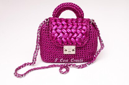 Bag with puff stitch flap