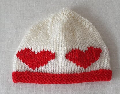 Kaley - Baby’s 8ply beanie with embroidered heart motifs