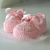 Pink baby shoes with bow
