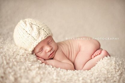 #3 Newborn cabled beanie