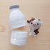 Baby Cow in Giant Milk Bottle