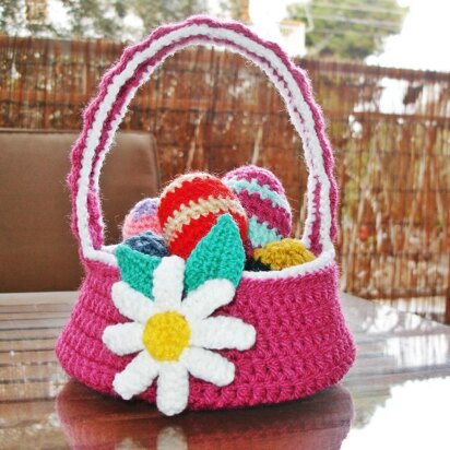 Easter flower basket and coloured easter eggs