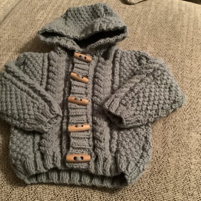 Baby jacket in super soft aran