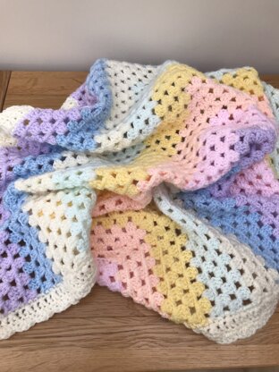 Pastel rainbow mitred blanket