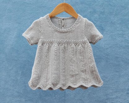 P185 Wavy Edged Chevron Dress