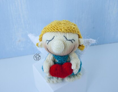 Small Cupid doll knitting flat