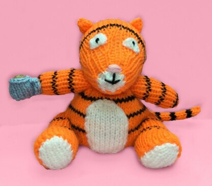 The Tiger Who Came To Tea orange cover / toy