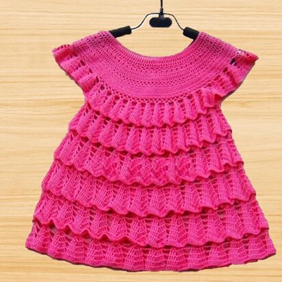 A crochet baby dress