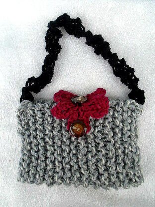 894 Two little purses- Two knit flowers