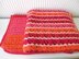 "Simply in red” baby blanket