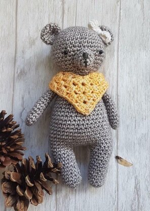 Bear with poncho and bow