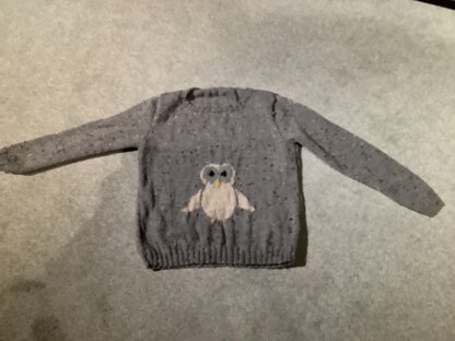 Adult jumper using intarsia motif from a child's pattern