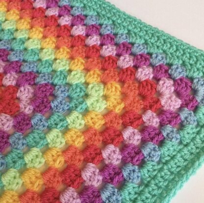 Happy Rainbow Granny Square Blanket