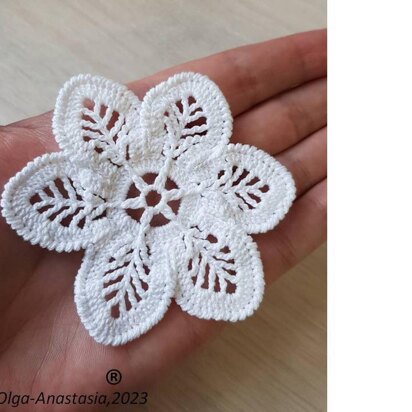 Crochet white openwork flower