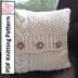 Braided cable and moss stitch pillow cover