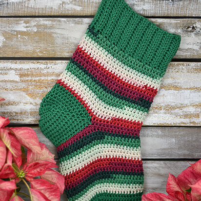 Poinsetiia Stocking in Universal Yarn Deluxe Stripes and Deluxe Worsted Superwash PDF