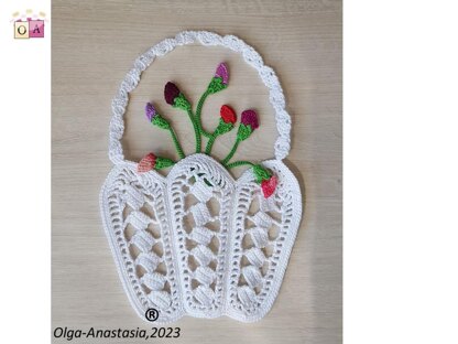 Crochet basket with a bouquet of flowers