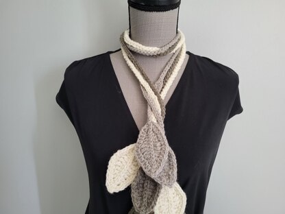 Scarf from leaves and cords