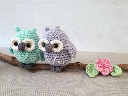 Owls couple on a branch