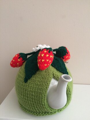 Nature tea cosy. Animal tea cosy .Pesky mouse in the strawberry patch