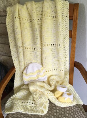 Baby afghan, hat, booties and mittens