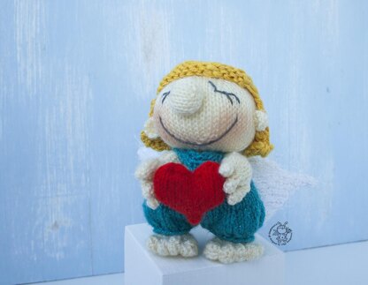 Small Cupid doll knitting flat