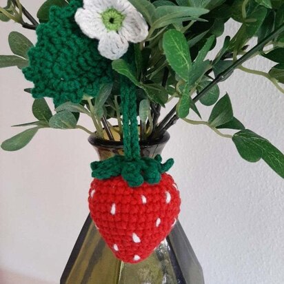 Strawberry with flower and leaf