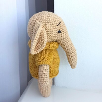 Elephant in a sweater plush toy