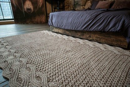 Wide rug with double braid