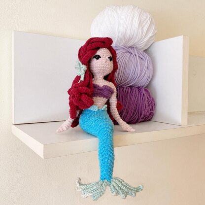 Mermaid sitting pose