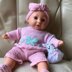 Buffy in her pink butterfly outfit.