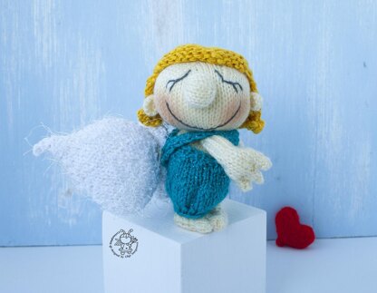 Small Cupid doll knitting flat