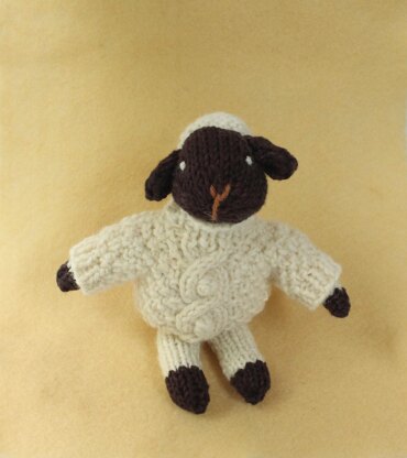 Lamb in cable jumper