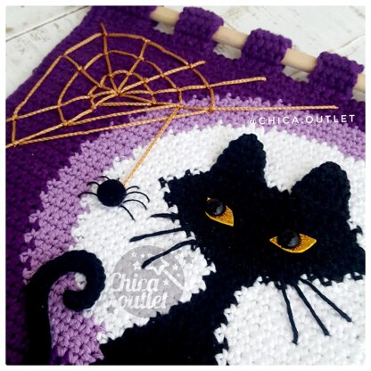 Black cat wall hanging