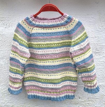 Children's sweater in striped pastel