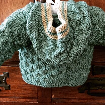 Green baby sweater