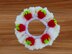 A Crochet Strawberry Scrunchie