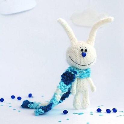 White rabbit in a blue striped scarf - knitting pattern