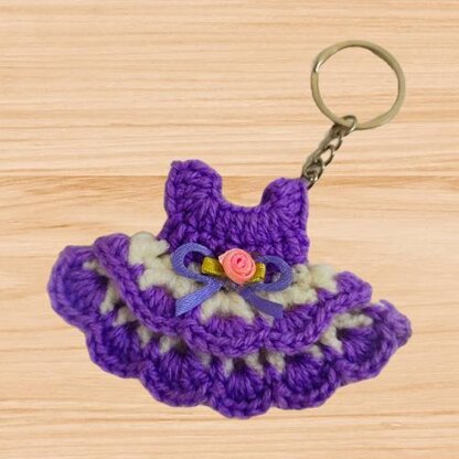 A crochet dress keychain