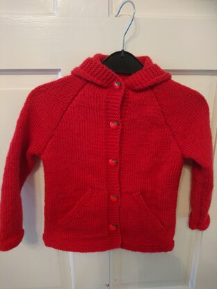 Red hooded cardi with Apple buttons