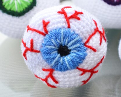 Crochet eyeballs. Creepy eyes. Halloween spooky eyes. Eyeball with blood vessels