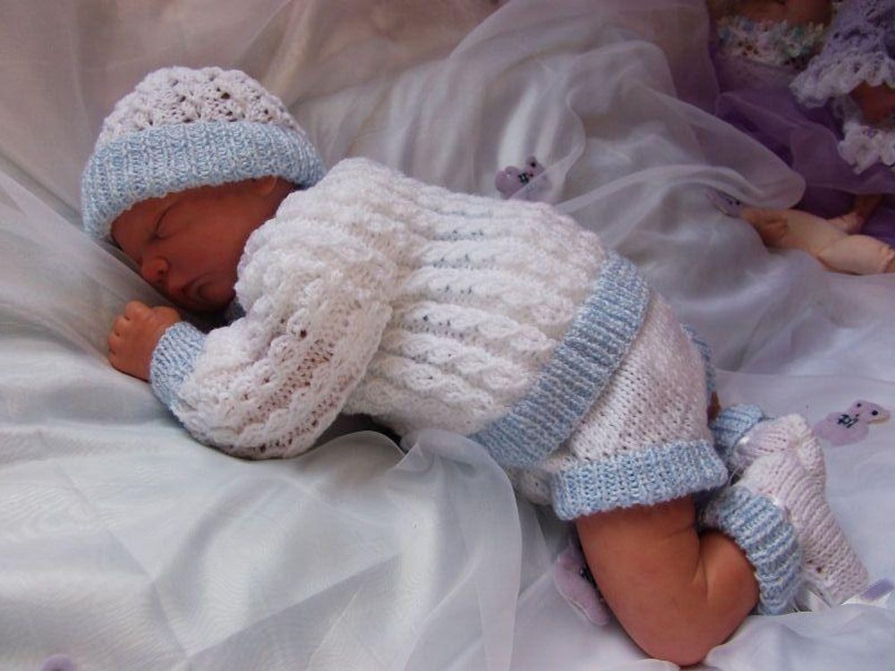 Knitted romper suits for hot sale babies