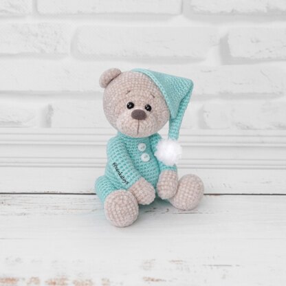 Plush bear in sleepwear
