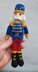 Knitted nutcracker doll