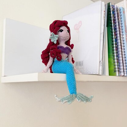 Mermaid sitting pose