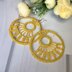 44. Sun symbol earrings