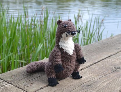 Crochet otter. Amigurumi toy. Realistic river otter. Crochet mammal