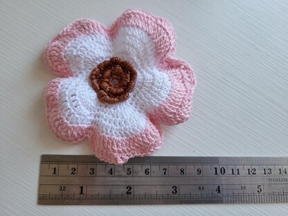 Pink and white crochet flower