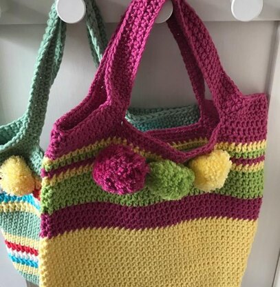 Crochet Pom Pom Bag Crochet pattern by Sweetpeafamily | LoveCrafts